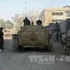 Xe tăng quân đội Syria ở Damascus (Nguồn: AFP/TTXVN)
