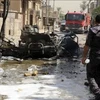 Hiện trường một vụ đánh bom ở Iraq. (Nguồn: laht.com)
