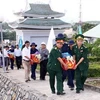 Lễ truy điệu và an táng hài cốt liệt sỹ quân tình nguyện và chuyên gia Việt Nam hy sinh tại Lào và Campuchia. Ảnh minh họa (Ảnh: Trần Lê Lâm/TTXVN)