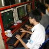 Vẫn còn nhiều học sinh trốn học để chơi game online. (Ảnh: Trung Hiền/Vietnam+)