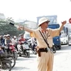 Cảnh sát giao thông sẽ phân luồng giao thông trong thời gian diễn ra Hội nghị lần thứ 44 Ngân hàng Phát triển Châu Á (ADB) (Ảnh: Mạnh Hùng/Vietnam+)