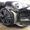 Chiếc siêu xe bị vỡ nát phần đầu vì va chạm với đuôi xe khác. (Ảnh: Mạnh Hùng/Vietnam+)