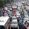 Việc tiến hành đổi giờ làm sẽ làm giảm ùn tắc giao thông trong thành phố. (Ảnh: Việt Hùng/Vietnam+)