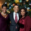 Vợ chồng tổng thống Obama chụp ảnh với nữ hoàng dẫn chương trình truyền hình Oprah Winfrey tại Nhà Trắng. (Ảnh: AP)