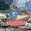 Cảnh tàn phá do sóng thần gây ra ở San Antonio, Valparaiso, một ngày sau trận động đất kinh hoàng. (Nguồn: AFP/TTXVN) 