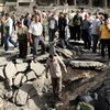 Cảnh sát Syria điều tra tại hiện trường vụ nổ ở Damascus. (Nguồn: AFP/TTXVN)