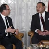 Tổng thống Pháp Francois Hollande (trái) và Nhà vua Morocco Mohammed VI trong cuộc gặp tại Casablanca. (Nguồn: AFP/TTXVN)