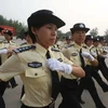Buổi ra mắt lực lượng bảo vệ chuyên nghiệp (Nguồn:Chinadaily)