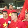 Nhóm cổ động viên Hải Phòng vẫn tin Việt Nam sẽ thắng 3-0 trận lượt về. (Ảnh: Xuân Triển/Vietnam+)