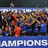 Đội tuyển Malaysia ăn mừng chức vô địch tại AFF Suzuki Cup. (Nguồn: AFP/TTXVN)