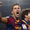 David Villa (trái) chung với với Messi. (Nguồn: Reuters)