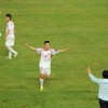 Niềm vui chiến thắng của các cầu thủ Sông Lam Nghệ An. (Ảnh: Thành Dương/TTXVN)