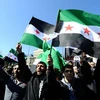 Những người biểu tình phản đối Tổng thổng Syria Bashar al-Assad. (Nguồn: Getty)