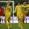 Các cầu thủ Ukraine ăn mừng chiến thắng. (Nguồn: Getty)