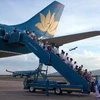 Vietnam Airlines vận chuyển hành khách tới sân bay Đà Nẵng. (Ảnh: Ngọc Hà/TTXVN)