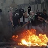 Người dân Palestine biểu tình phản đối bộ phim báng bổ đạo Hồi. (Nguồn: AFP/ TTXVN)