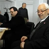 Lãnh đạo đảng Ennahda cầm quyền, ông Rached Ghannouchi (phải). (Nguồn: AFP)