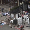Khám nghiệm hiện trường vụ nổ ở Boston. (Nguồn: AFP)