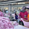 Campuchia nhập khẩu chủ yếu nguyên phụ liệu ngành dệt may và xuất khẩu sản phẩm may mặc. (Ảnh: Xuân Khu/Vietnam+)