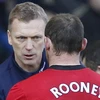 David Moyes và Rooney cần phải đồng tâm hiệp lực để giúp M.U bảo vệ ngôi vương. (Nguồn: AFP)