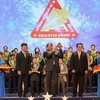 Các doanh nghiệp nhận giải thưởng Sao Vàng đất Việt 2013. (Ảnh: Tuấn Anh/TTXVN)