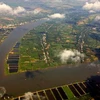 Sông Hậu chảy trên địa bàn hai tỉnh An Giang và Đồng Tháp. (Ảnh: Duy Khương/TTXVN)