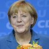 Thủ tướng Đức Angela Merkel mừng chiến thắng tại trụ sở của đảng CDU ở thủ đô Berlin sau cuộc bầu cử. (Ảnh: AFP/TTXVN)