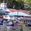 Một con đường chính khu vực trung tâm thành phố Fagatogo bị ngập do sóng thần. (Ảnh: AP)