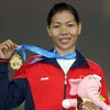 Vũ Thị Hương giành huy chương vàng nội dung 200m nữ với thành tích 23 giây 31. (Ảnh: Quang Nhựt/TTXVN) 
