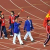 Đoàn Thể thao Việt Nam diễu hành tại lễ bế mạc SEA Games 25. (Ảnh: Quang Nhựt/TTXVN)
