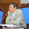 Phó Thủ tướng Phạm Gia Khiêm chủ trị cuộc họp Ủy ban Quốc gia ASEAN lần thứ 3. (Ảnh: Nhan Sáng/TTXVN)
