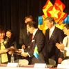 Lễ ký kết biên bản ghi nhớ giữa Hội Liên hiệp Phụ nữ Việt Nam và Công ty Oriflame Việt Nam. (Ảnh: Hữu Duyên/Vietnam+)