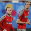 Rooney và Crouch sẽ đá cặp cùng nhau trên hàng công của tuyển Anh? (Nguồn: Reuters)
