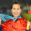 Trương Thanh Hằng trên bục nhận huy chương bạc. (Ảnh: Quốc Khánh/TTXVN)