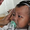 Trẻ em Trung Quốc bị ngộ độc do dùng sữa nhiễm melamin. (Nguồn: Internet)