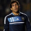 Tevez bày tỏ sự thất vọng sau khi không thực hiện thành công quả penalty. (Nguồn: Reuters)