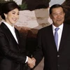 Thủ tướng Yingluck Shinawatra và Thủ tướng Hun Sen. (Nguồn: AP)