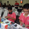 Đoàn Việt Nam tham gia Giải vô địch khối Rubik thế giới năm 2011. (Ảnh: Ngọc Tiến/TTXVN)