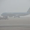 Sương mù bao phủ tại sân bay quốc tế Nội Bài. (Nguồn: VNE)