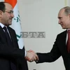 Tổng thống Nga Vladimir Putin và Thủ tướng Iraq Nuri Al-Maliki. (Nguồn: EPA)