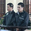 Hai bị cáo Nguyễn Tuấn Dũng và Đinh Văn Huỳnh.