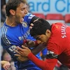 Suarez cắn trộm Ivanovic trong trận hòa kịch tính