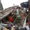 Hiện trường vụ động đấy ở huyện Lô Sơn, tỉnh Tứ Xuyên ngày 21/4. (Nguồn: THX/TTXVN)