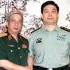 Thứ trưởng Nguyễn Chí Vịnh chào xã giao Bộ trưởng Quốc phòng Trung Quốc. (Ảnh: TTXVN)