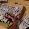 Đồng rupee xuống mức thấp nhất. (Nguồn: AFP)