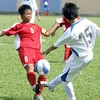 Nữ U14 Việt Nam (áo đỏ) vô địch.