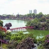 Hồ Hoàn kiếm, một di sản văn hóa của thủ đô Hà Nội với quần thể cầu Thê Húc, đền Ngọc Sơn và Tháp Rùa. (Ảnh: Đình Na/TTXVN)