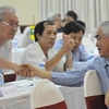 Phó chủ tịch VFF Lê Hùng Dũng (phải) với phó ban Tư vấn đạo đức Nguyễn Văn Vinh.