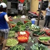 Thực phẩm lên giá theo kiểu “lùi một bước tiến ba bước.” (Ảnh: Quỳnh Trang/Vietnam+