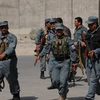 Cảnh sát Afghanistan đến khu vực xảy ra đọ súng ở Kabul ngày 13/9 vừa qua. (Ảnh: AFP/TTXVN)